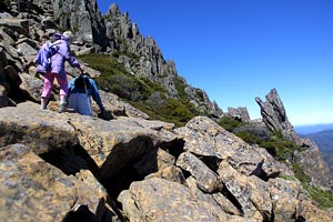 Climbers negotiate the boulders