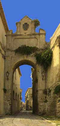 arch over street in Gerace, Italy